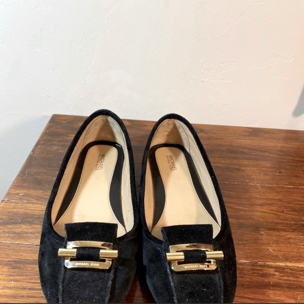 3 pair of size 9 Micheal Kors used flats. As is.  $60.00